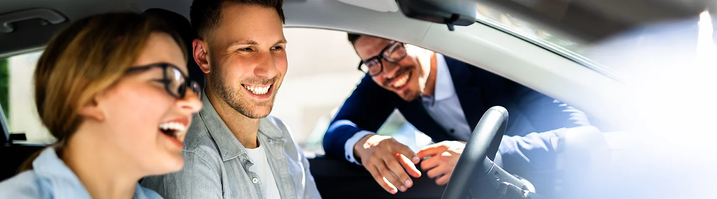 people joking in a car