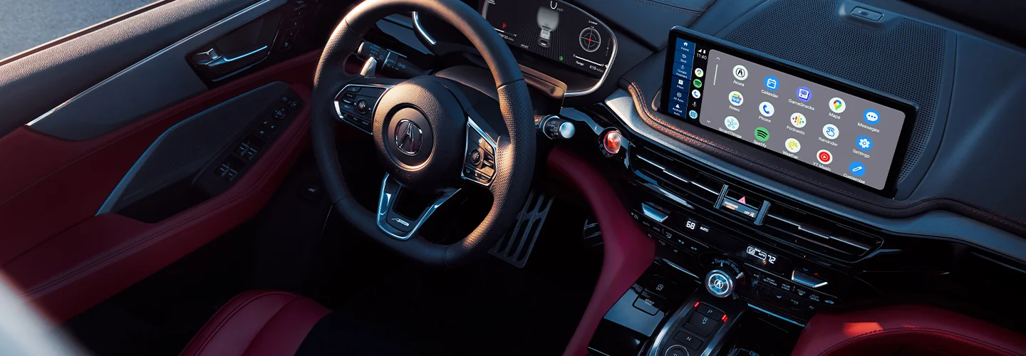 Interior view of the dashboard and tech in a 2025 Acura MDX