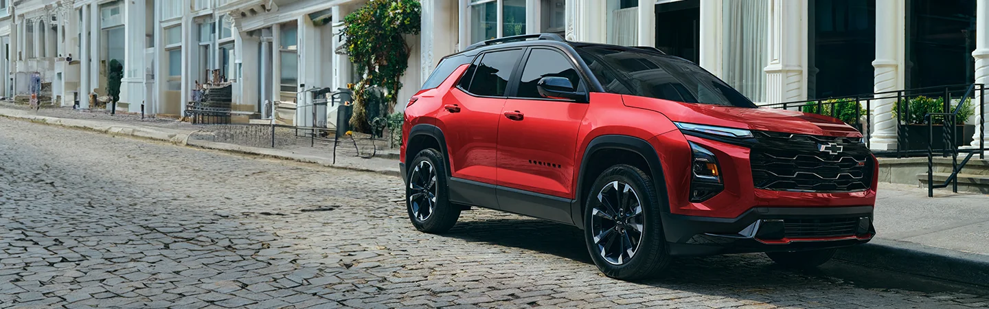 red 2026 Chevrolet Equinox LT parked in city