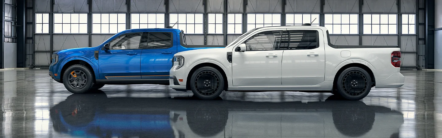 blue and white Ford Maverick models side by side