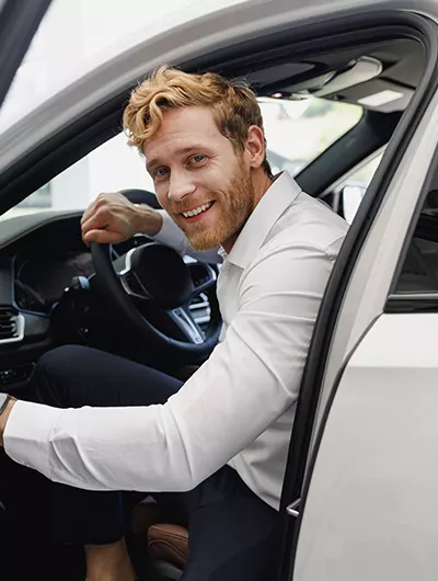 Happy customer getting in there new car at Lamborghini Charlotte in Charlotte, NC