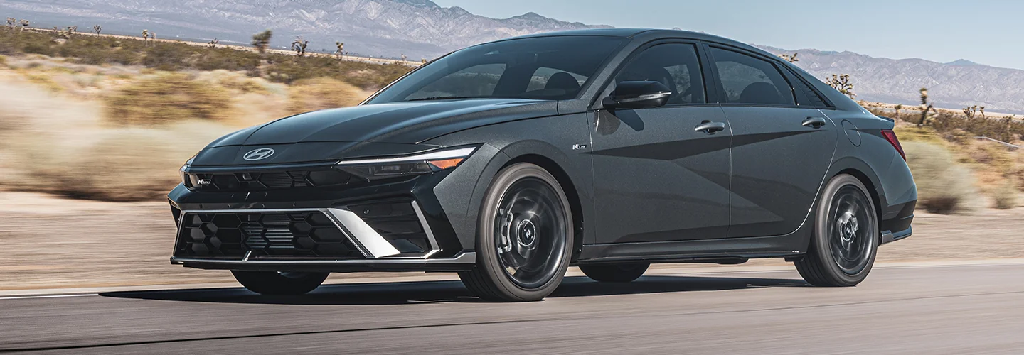 front view of a Pre-Owned silver Hyundai Elantra