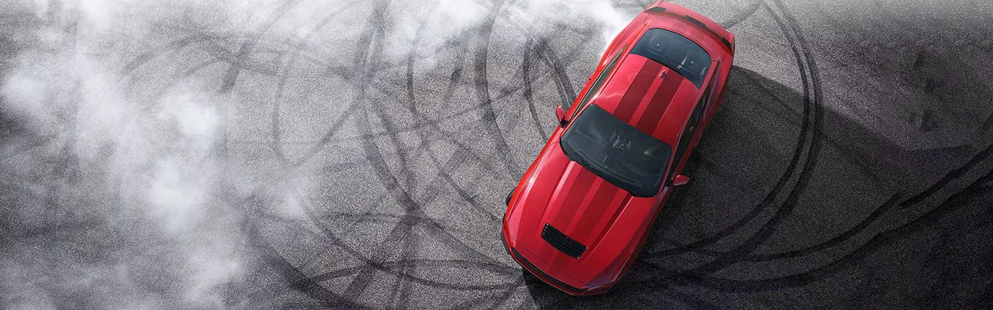 2024 Ford Mustang vs Dodge Charger top view in red