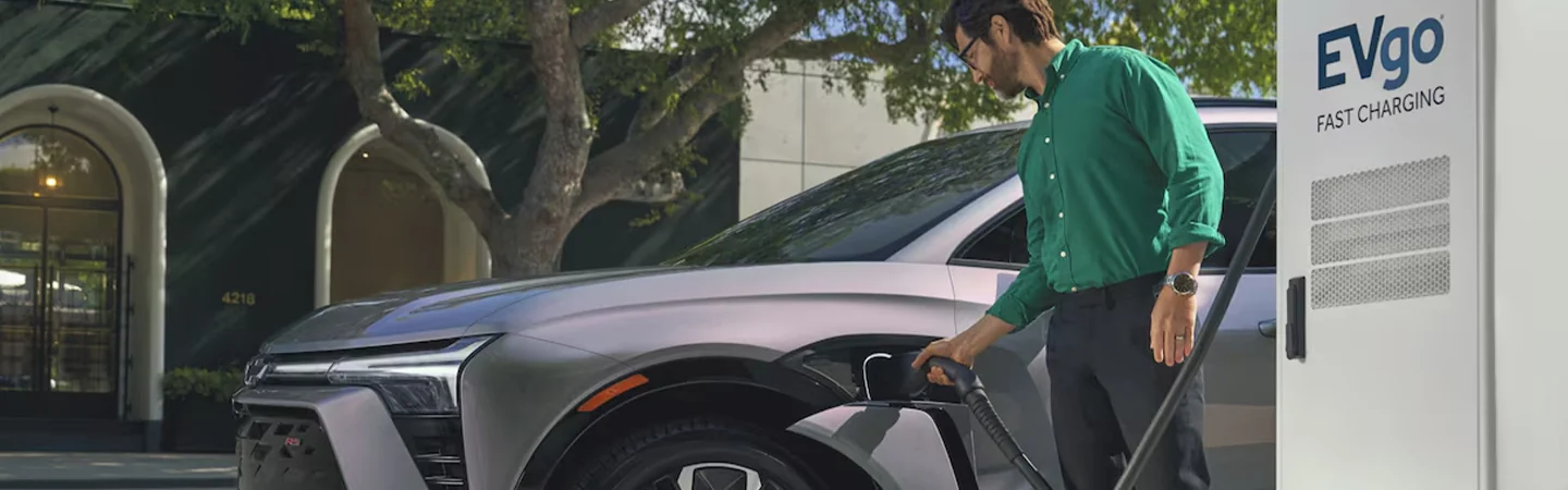 2025 Chevy Blazer EV SUV plugging in to charge