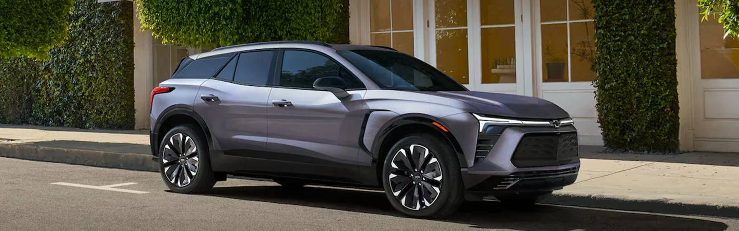 Gray 2025 Chevy Blazer EV SUV parked on a city street