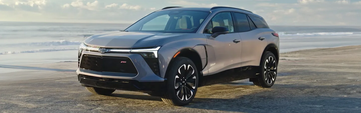 Front view of a parked 2025 Chevy Blazer EV SUV at the beach