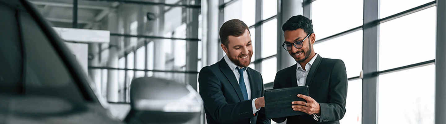 two people talking about specifications of a car