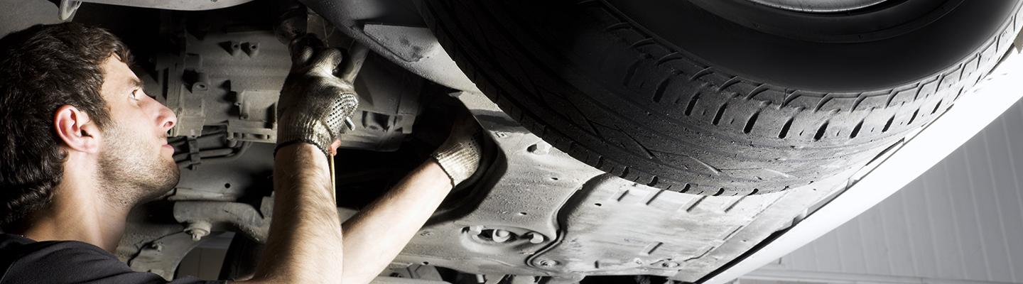 Technician performing auto repair service at Hilton Head BMW