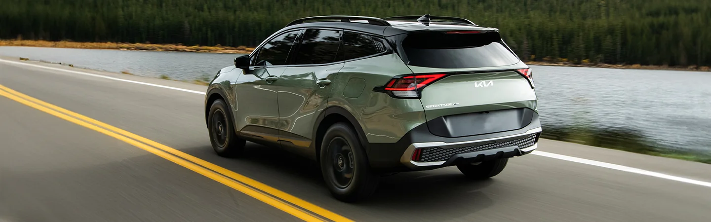 2024 Kia Sportage vs Hyundai Tucson back side grey