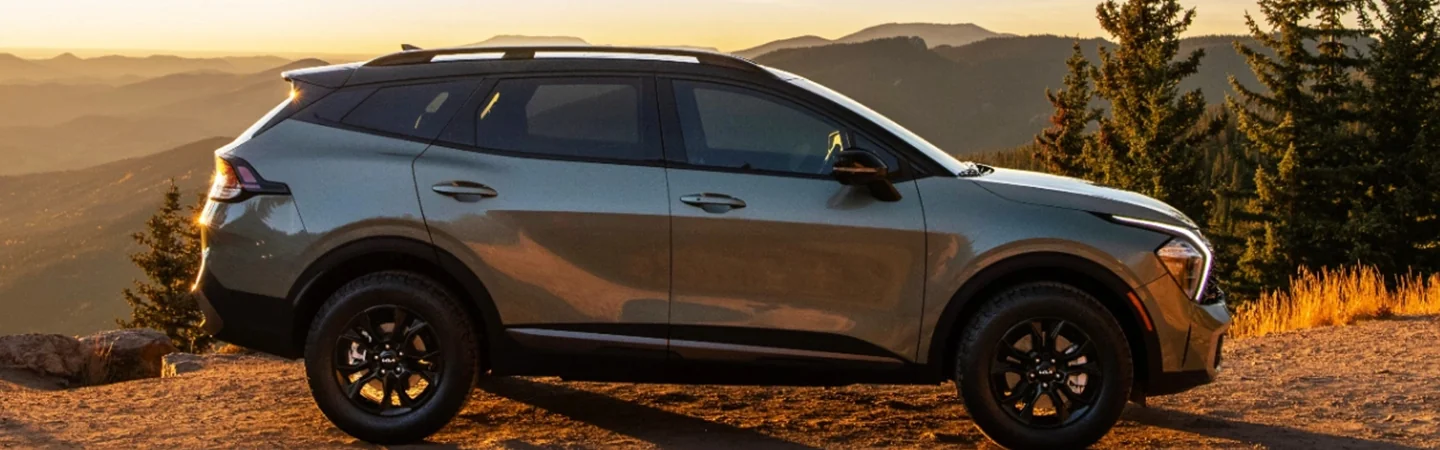 2024 Kia Sportage vs Hyundai Tucson front side grey
