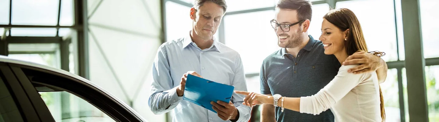 people car shopping in showroom