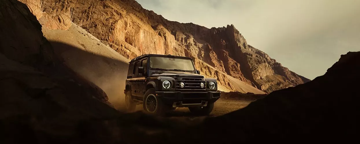 New INEOS GRENADIER near desert mountains
