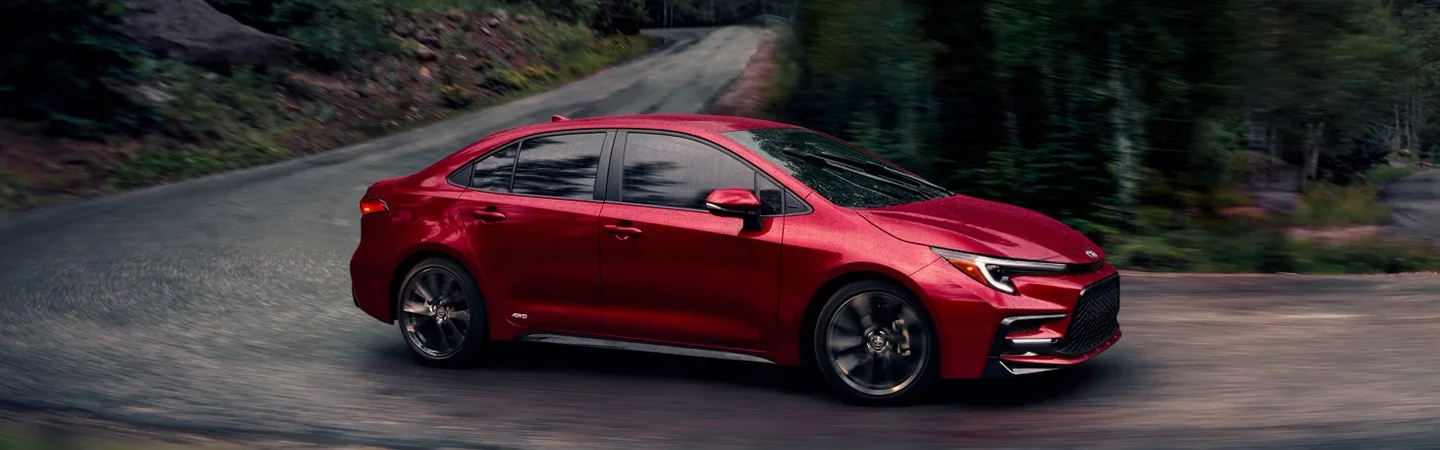 Toyota Corolla driving in mountains