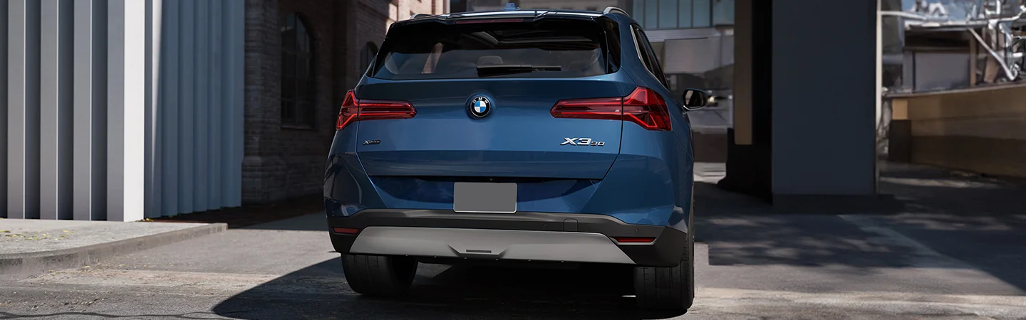 2025 BMW X3 vs BMW X5 blue color back Car Standing on view