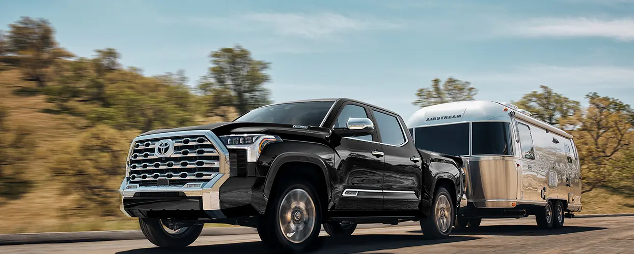 Toyota truck towing a camper