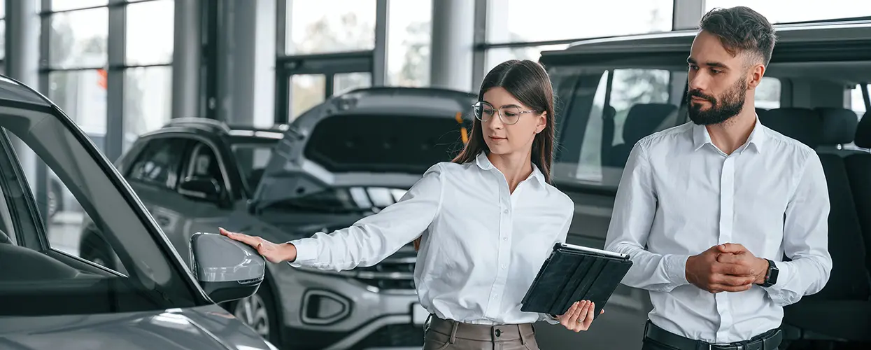 people car shopping in showroom