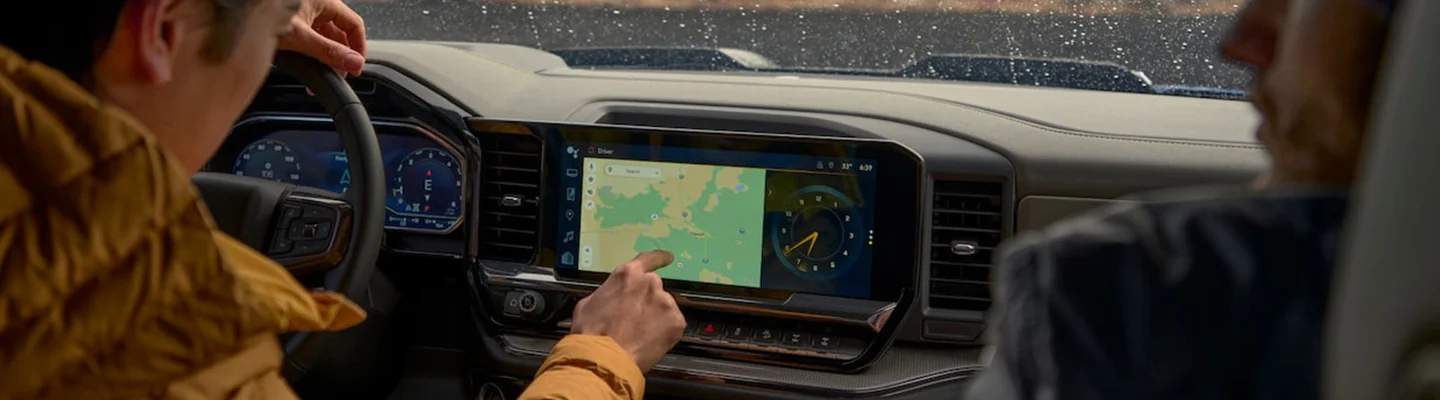 People using the in dash tech in a 2024 Chevrolet Silverado