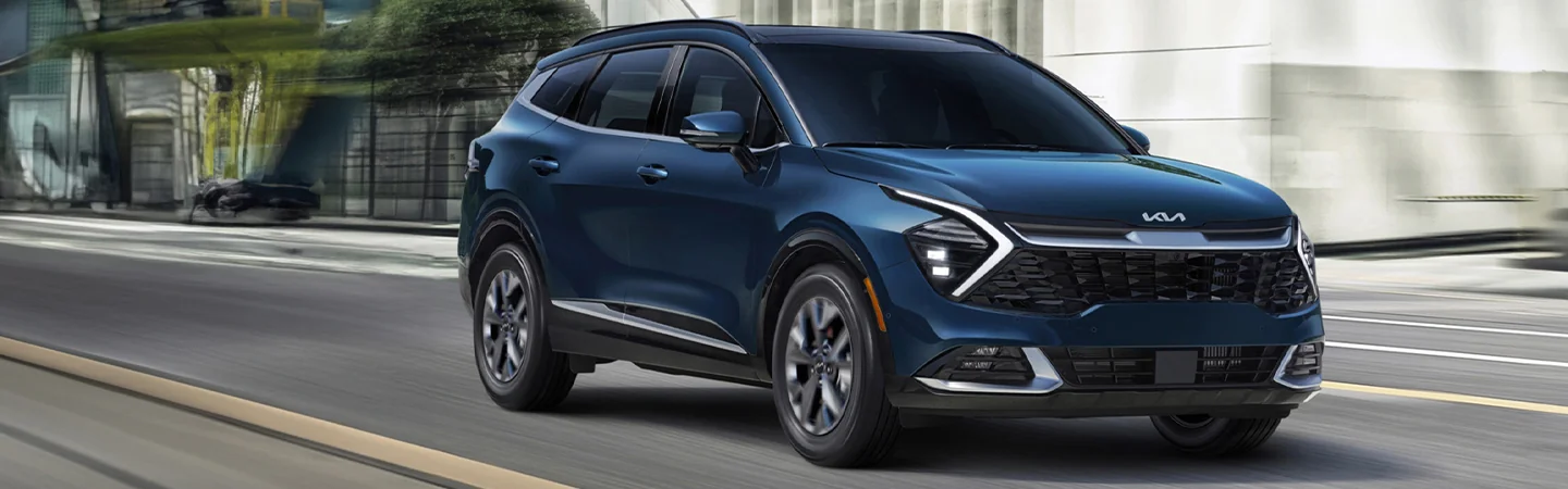 driving in the city with a 2025 Kia Sportage Hybrid