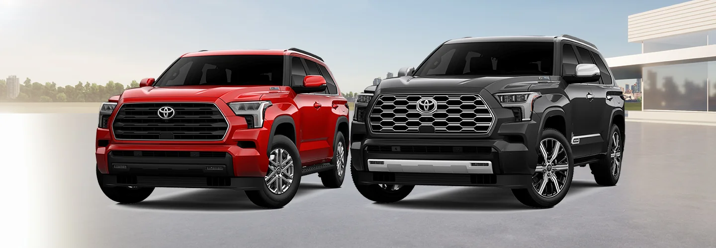 red and black car on the road with front view