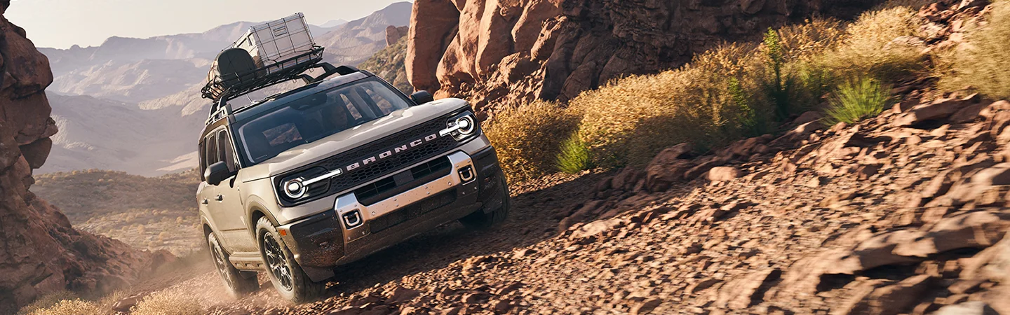 white 2025 Ford Bronco Sport Badlands going up hill