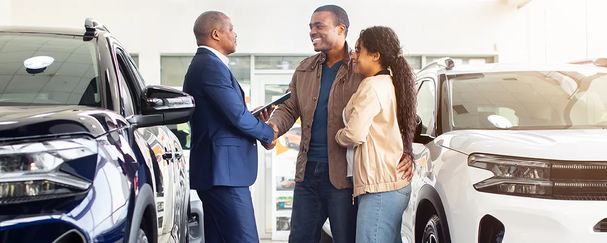 people car shopping in showroom