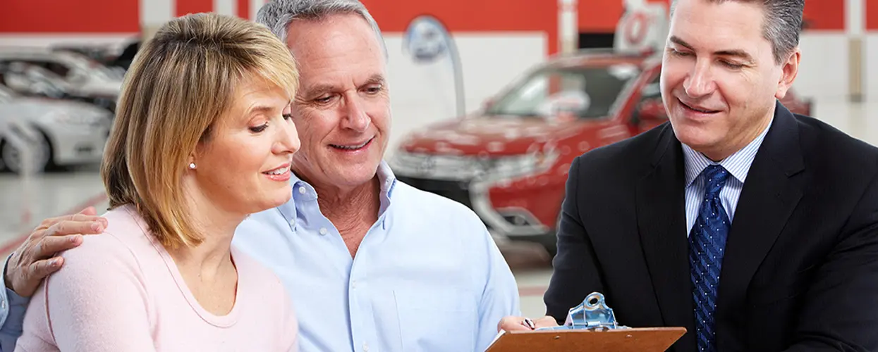 people car shopping in showroom