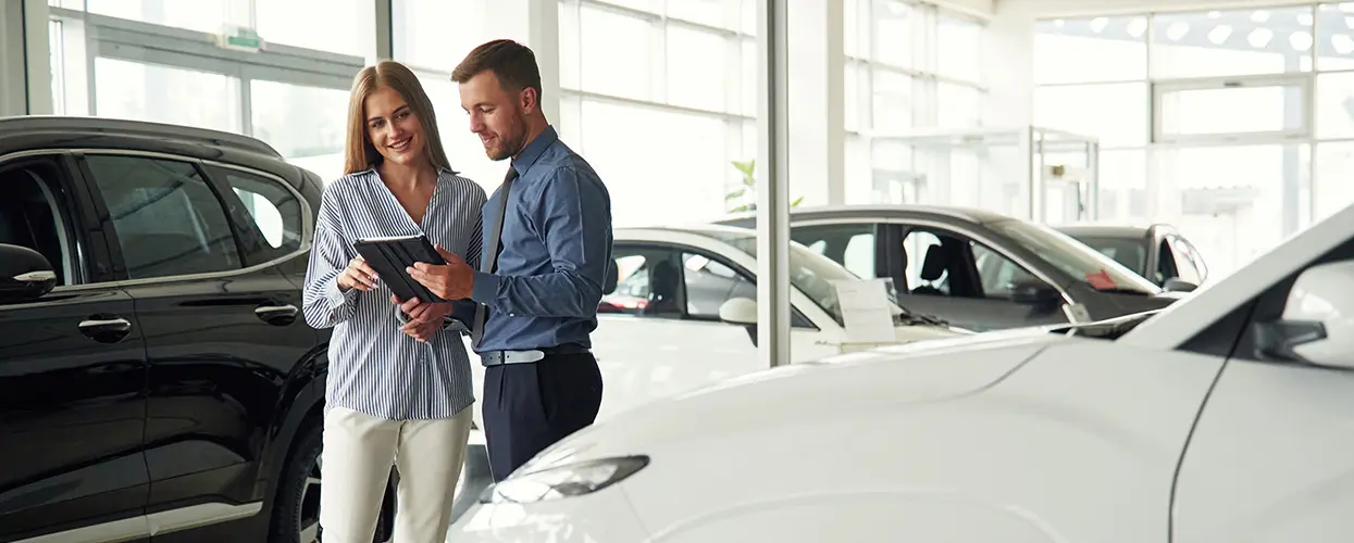car shopping in showroom at Honda of Lake City