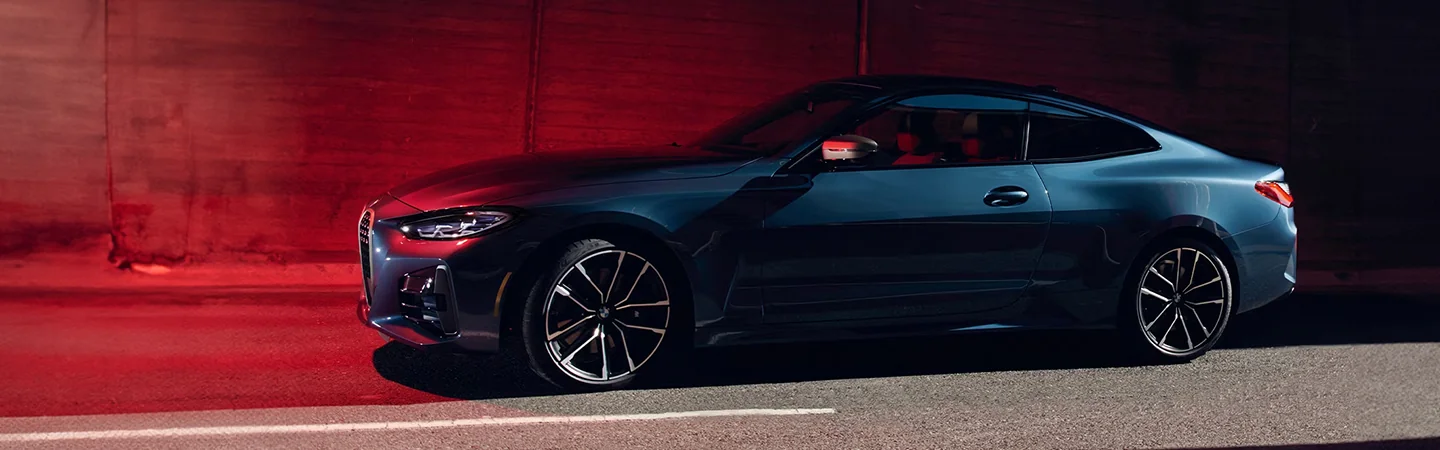 2024 BMW 4 Series side front in blue