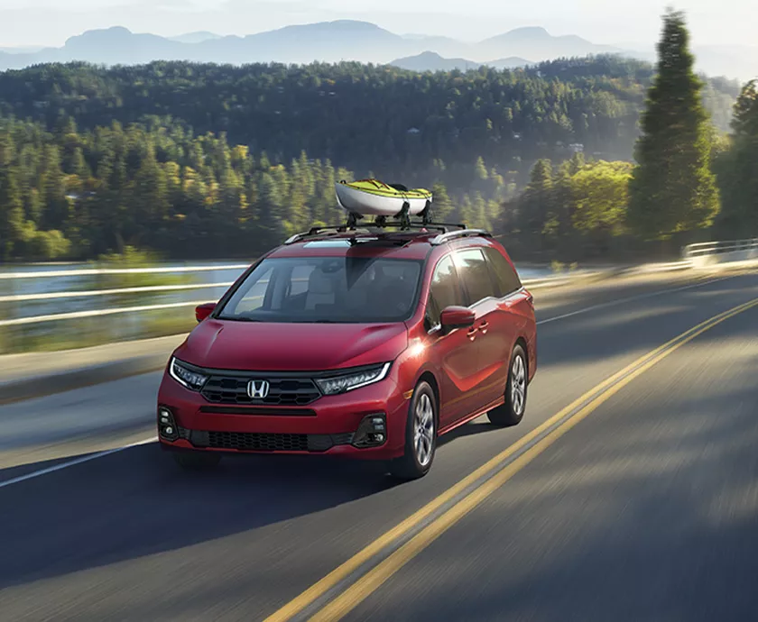 2026 Honda Odyssey Exterior Design sleek lines, smart aerodynamics carrying a kayak
