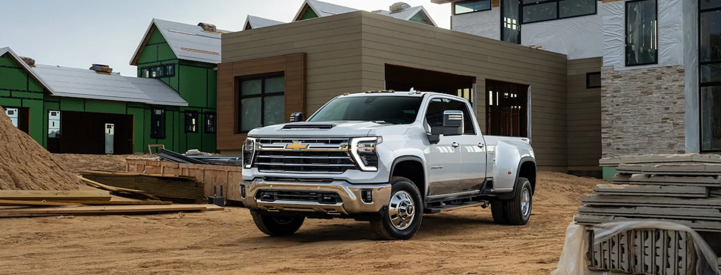2025 Chevrolet Silverado HD parked at a construction site 