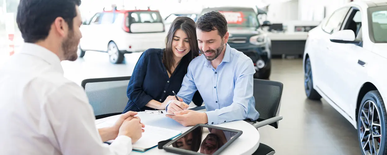 people car shopping in showroom
