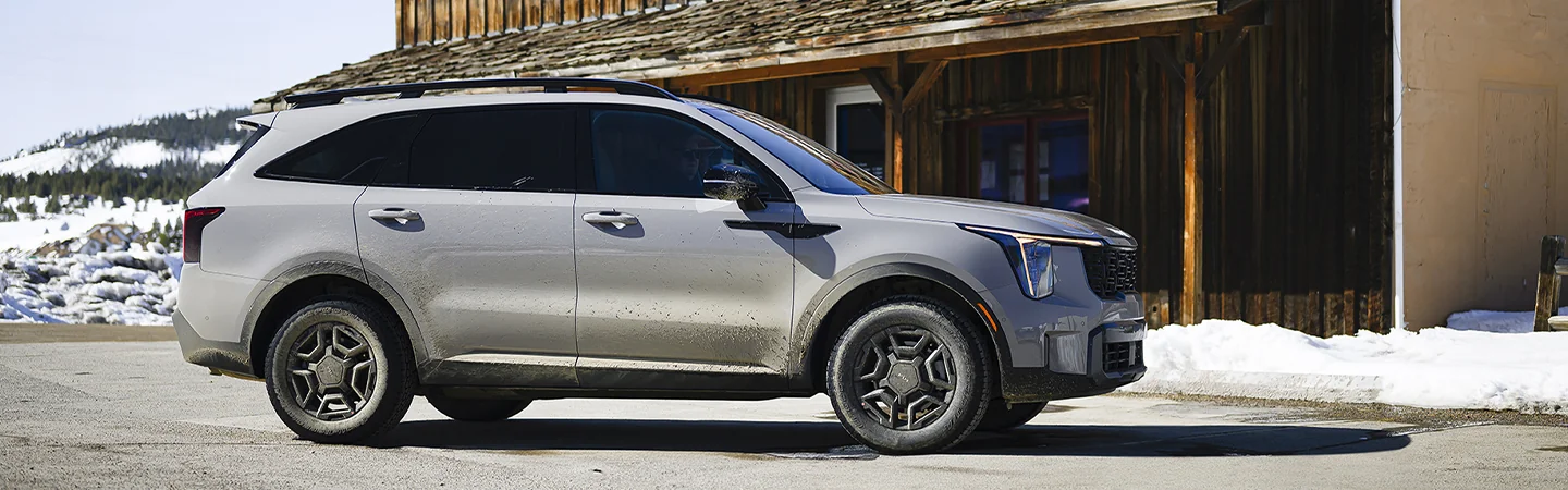 white 2025 Kia Sorento parked on snow mountain