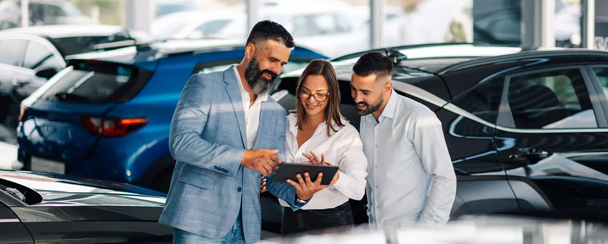 people car shopping in showroom