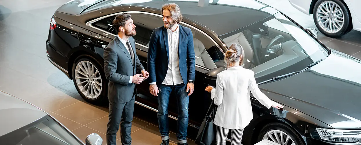 people car shopping in showroom