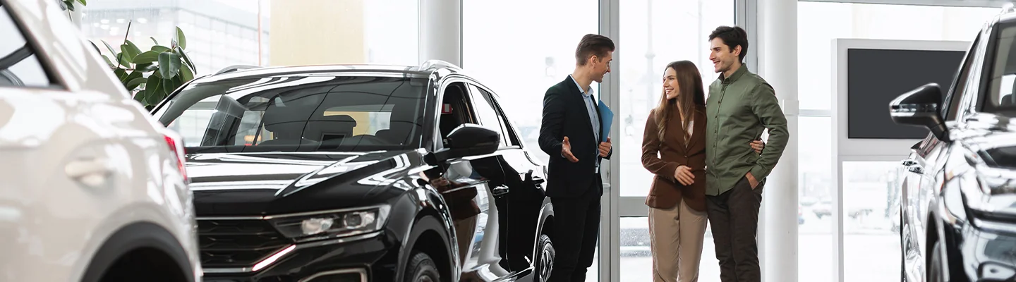 Best Place to Buy a Used Car in Jacksonville, FL Service Man is looking at the cars for clients