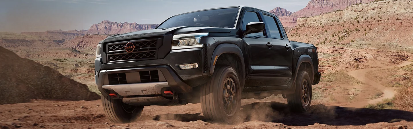 2024 Nissan Frontier Specs front side in black 