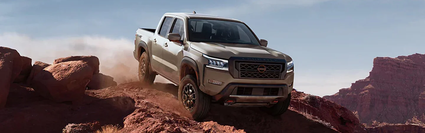 2024 Nissan Frontier Specs front side in brown 