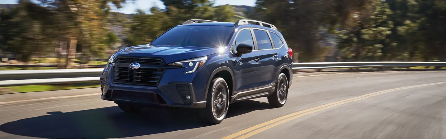 2024 Subaru Ascent vs Honda Pilot back side view red