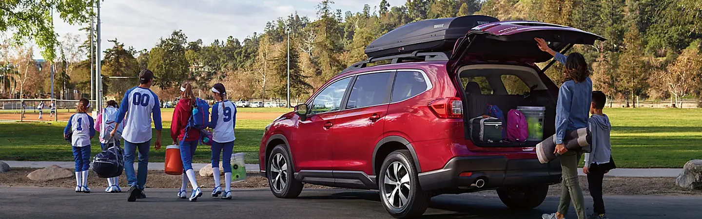 2024 Subaru Ascent vs Honda Pilot front side view blue