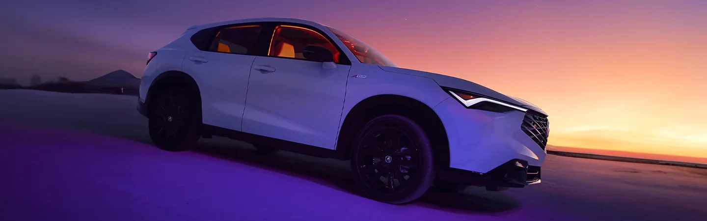 2025 Acura ADX parked in the desert at night