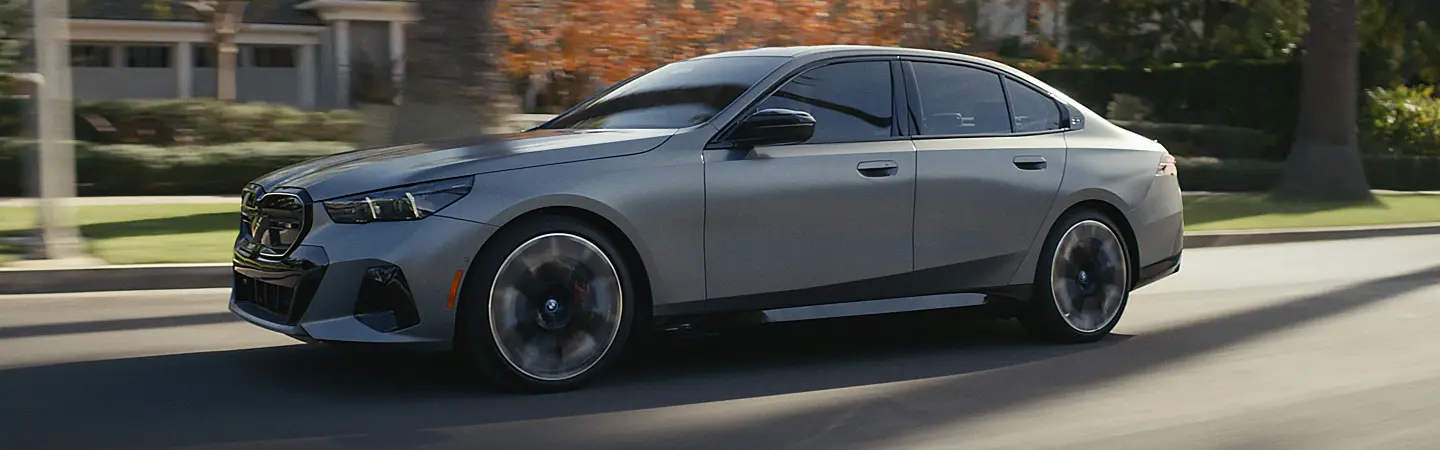 2024 BMW i5 Specs red sideview