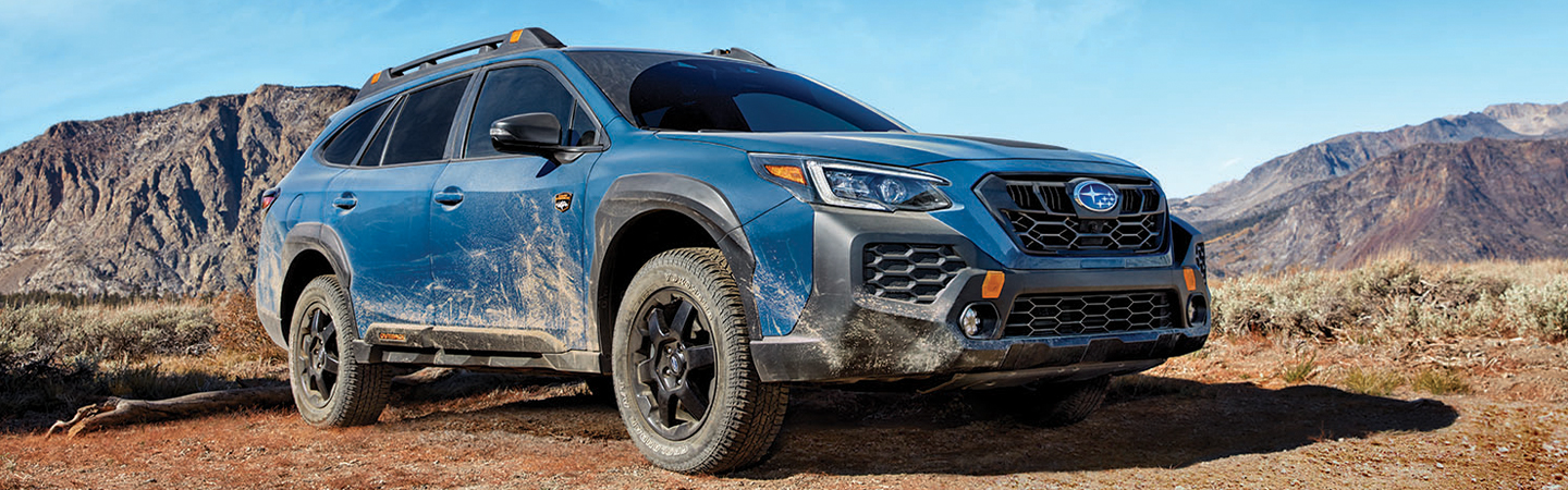 2024 Subaru Outback Comparison side front in white in colour