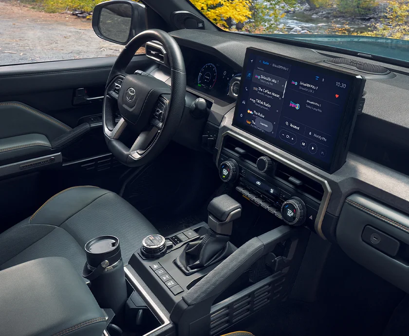 Interior view of the front seat dashboard and tech of a 2026 Toyota 4Runner