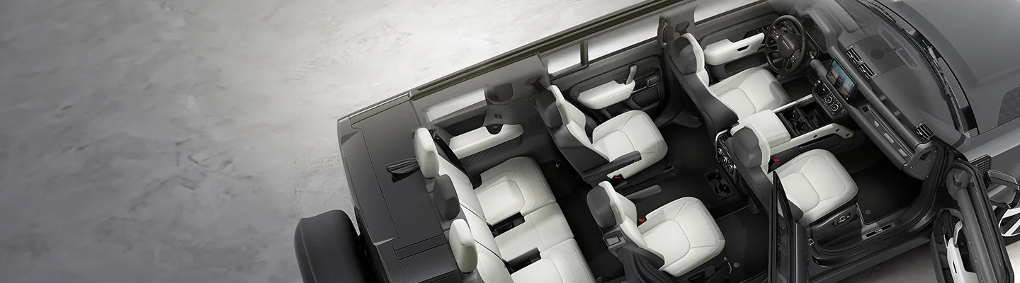 top view with no roof of a Land Rover showing multi-row seating