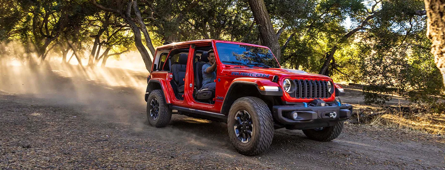 a red 2025 Jeep Wrangler with doors removed