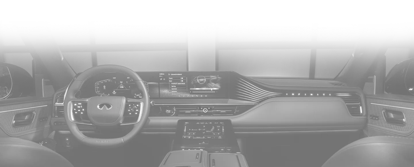 Inside look of the dashboard and tech in an Infiniti