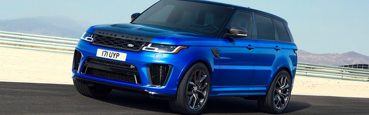 Blue Range Rover in motion