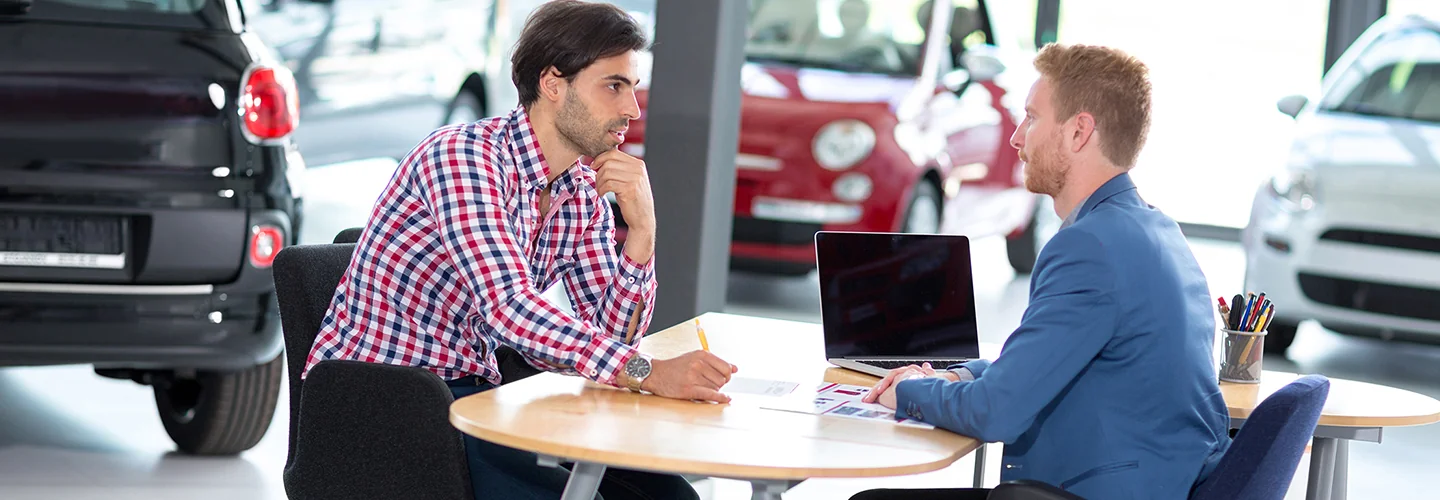 Man speaking with finance advisor