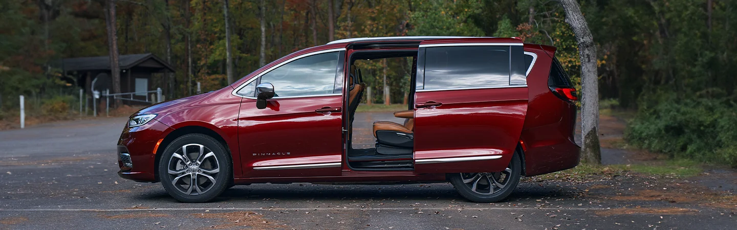 Side view of a parked 2026 Chrysler Pacifica with the side door open