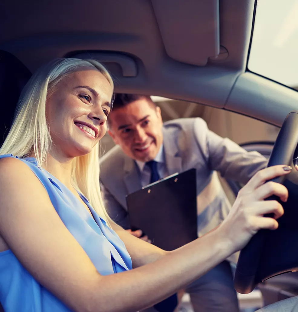 woman shopping in new car